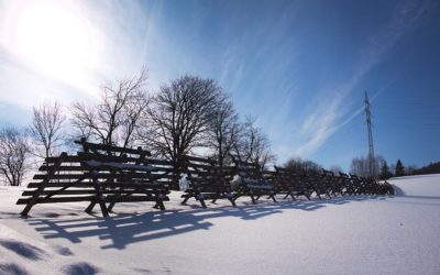 Electric Pole Power Post And Wooden Snow Fence Barrier