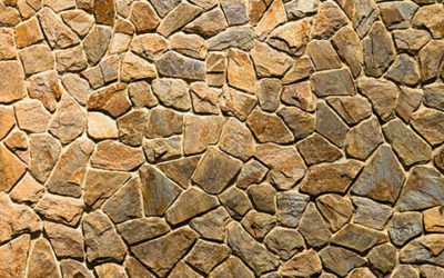 Rock Wall Texture Lit By The Sun Background