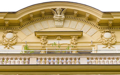 Soffit With Bust And Balcony Of An Old Building